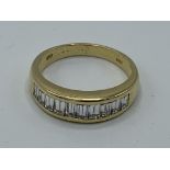 18ct gold ring set with 10 baguette diamonds, size N, weight 4.3gms. Estimate £400-500.