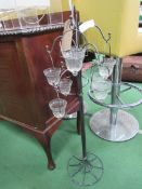 Metal and glass garden tea light holder, height 100cms. Estimate £20-30.