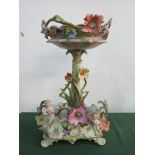 Very decorative porcelain table centre piece, flowers and cupids, height 37cms. Estimate £30-50.