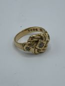 18ct gold and 3 diamond ring, size K, weight 6.4gms. Estimate £200-250.