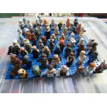 A quantity of Lego, including Star Wars, mini figures, Millennium Falcon etc plus instructions and