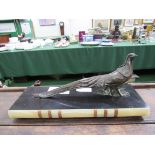 Brass figurine of a cock pheasant on onyx and marble plinth. Length 32cms. Estimate £20-40.