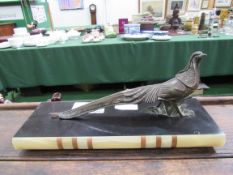 Brass figurine of a cock pheasant on onyx and marble plinth. Length 32cms. Estimate £20-40.