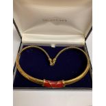 Gold plated enamel necklace by Monet designed from the 70's signed. Est £10-15