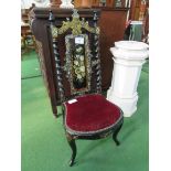 Ebonised and mother of pearl inlaid low chair. Estimate £20-30.