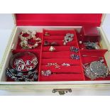 A box of costume jewellery. Estimate £20-30.