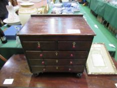 Mahogany small/apprentice piece chest of 2 over 3 drawers with ivory escutcheons. Estimate £30-50.