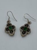 925 silver earrings set with green and white stones. Estimate £30-40.