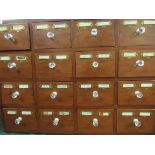 Set of 16 Apothecary drawers. Estimate £30-40.