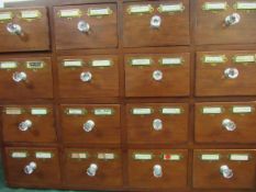 Set of 16 Apothecary drawers. Estimate £30-40.