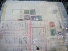 Box of stamps on album pages and stock books. Estimate £40-45.