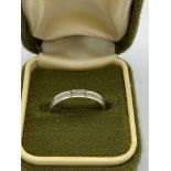 9ct white gold eternity ring, small and in box. Estimate £20-30.