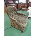 Victorian upholstered large armchair in original fabric. Estimate £20-40.