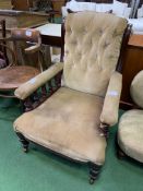 Victorian/Edwardian brown upholstered armchair on casters. Estimate £20-40.