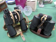 2 pairs of binoculars, Zeiss and Beck Kasel. Estimate £15-25.