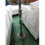 Brass decorated lamp standard and shade. Estimate £10-20.