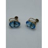 9ct gold pair of natural topaz earrings, weight 4.8gms. Estimate £250-280.