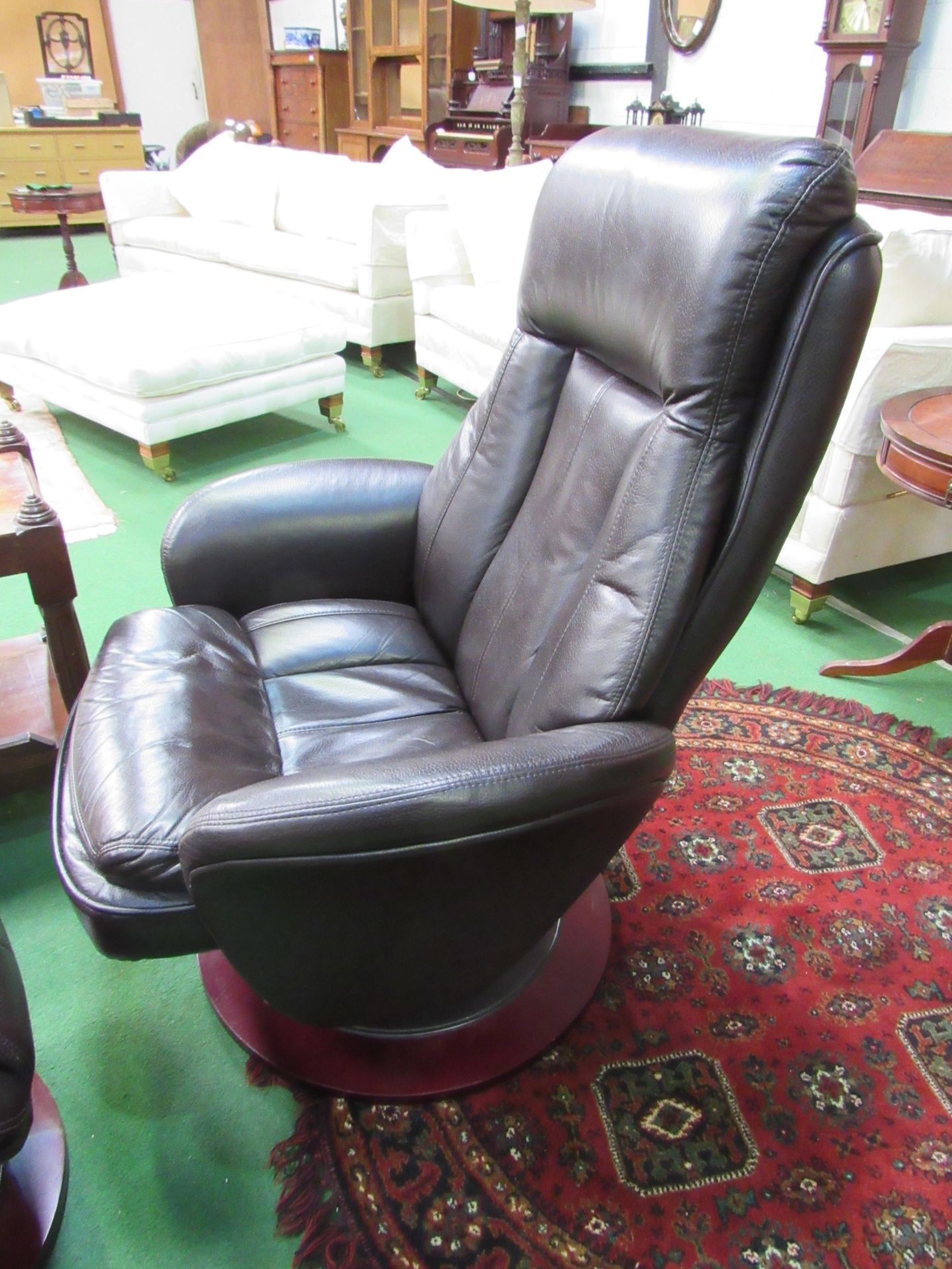 Dark brown leather-effect swivel chair and footstool. Estimate £30-50. - Image 2 of 4