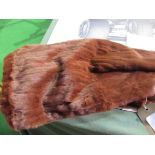 Fur stole. Estimate £20-30.