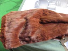 Fur stole. Estimate £20-30.