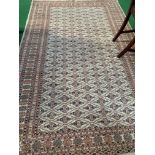Light brown ground patterned rug, 247 x 157. Estimated 20-40