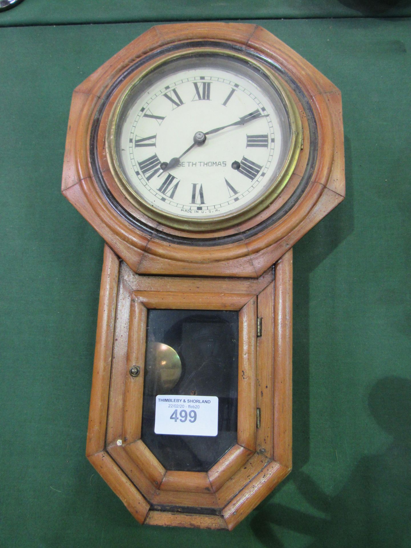 Seth Thomas pine case pendulum wall clock. Estimate £20-30.