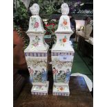 A pair of oriental-style vases. Estimate £50-60.