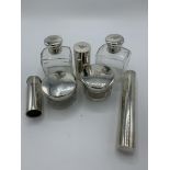 Mappin & Webb hallmarked silver 7 piece gentleman's toilet set with crested lids, London 1910,