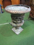 Copper garden urn, height 60cms; lead cherub supporting a fountain, height 75cms; metal winged