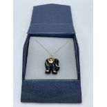 9ct gold onyx & ruby elephant necklace, length 23cms. Estimate £30-50