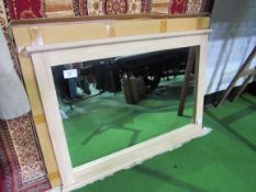 New, boxed, laminated frame wall mirror 80 x 112. Estimate £10-20.