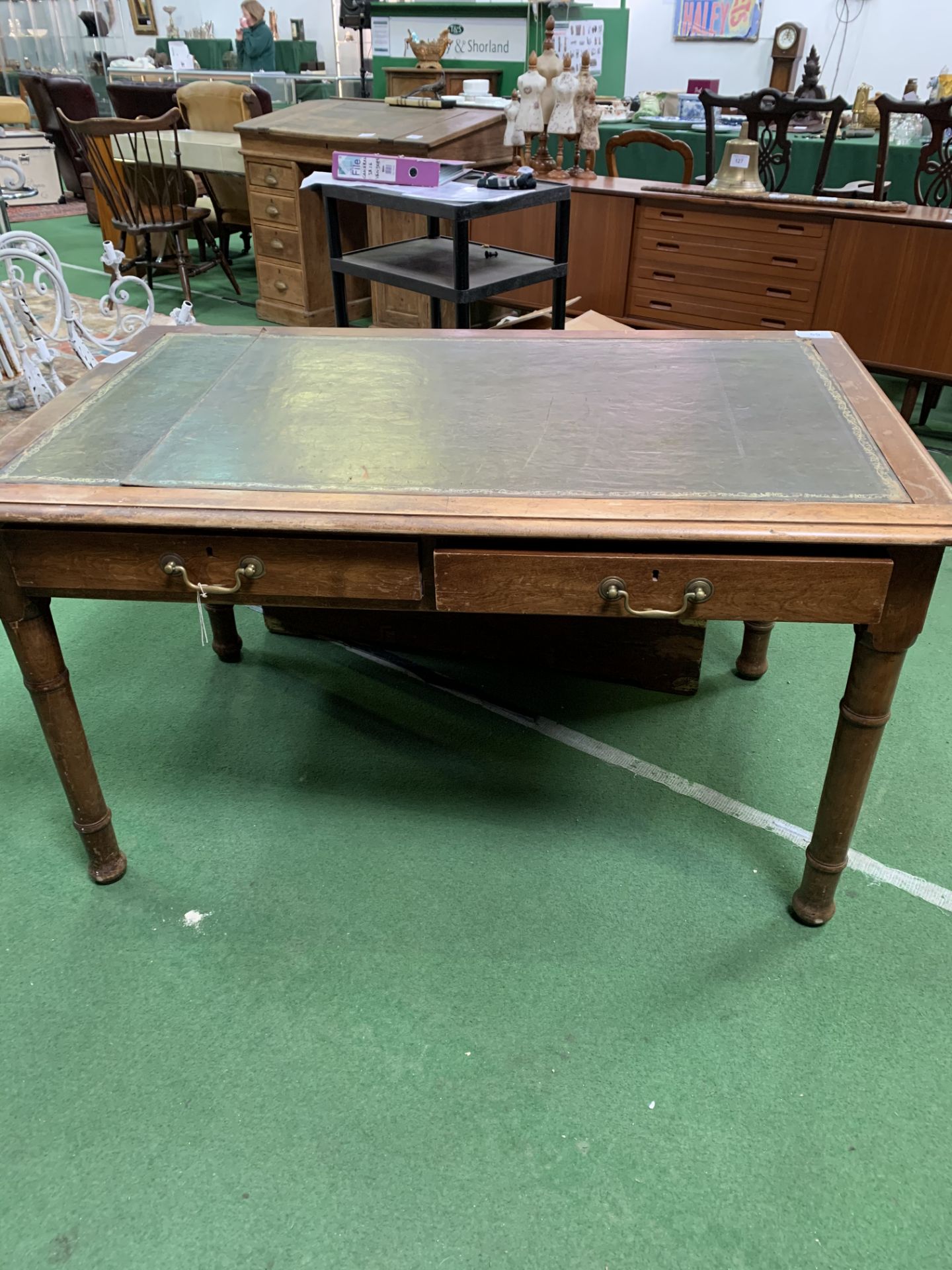 Mahogany writing table with leather skiver and 3 frieze drawers. 140 x 84 x 76cms. Estimate £20-40.