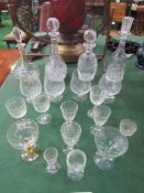 3 cut glass decanters and another and a quantity of drinking glasses. Estimate £20-30.