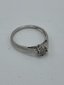 18ct white gold cluster ring containing 7 diamonds, size S 1/2, weight 2.4gms. Estimate £150-200.