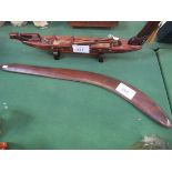 Large hardwood Aboriginal fighting boomerang with tribal markings. Estimate £30-50.