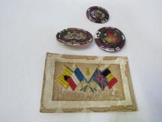 3 Prince Edward Island enamel brooches, 2 marked RD 1904; together with a French postcode from