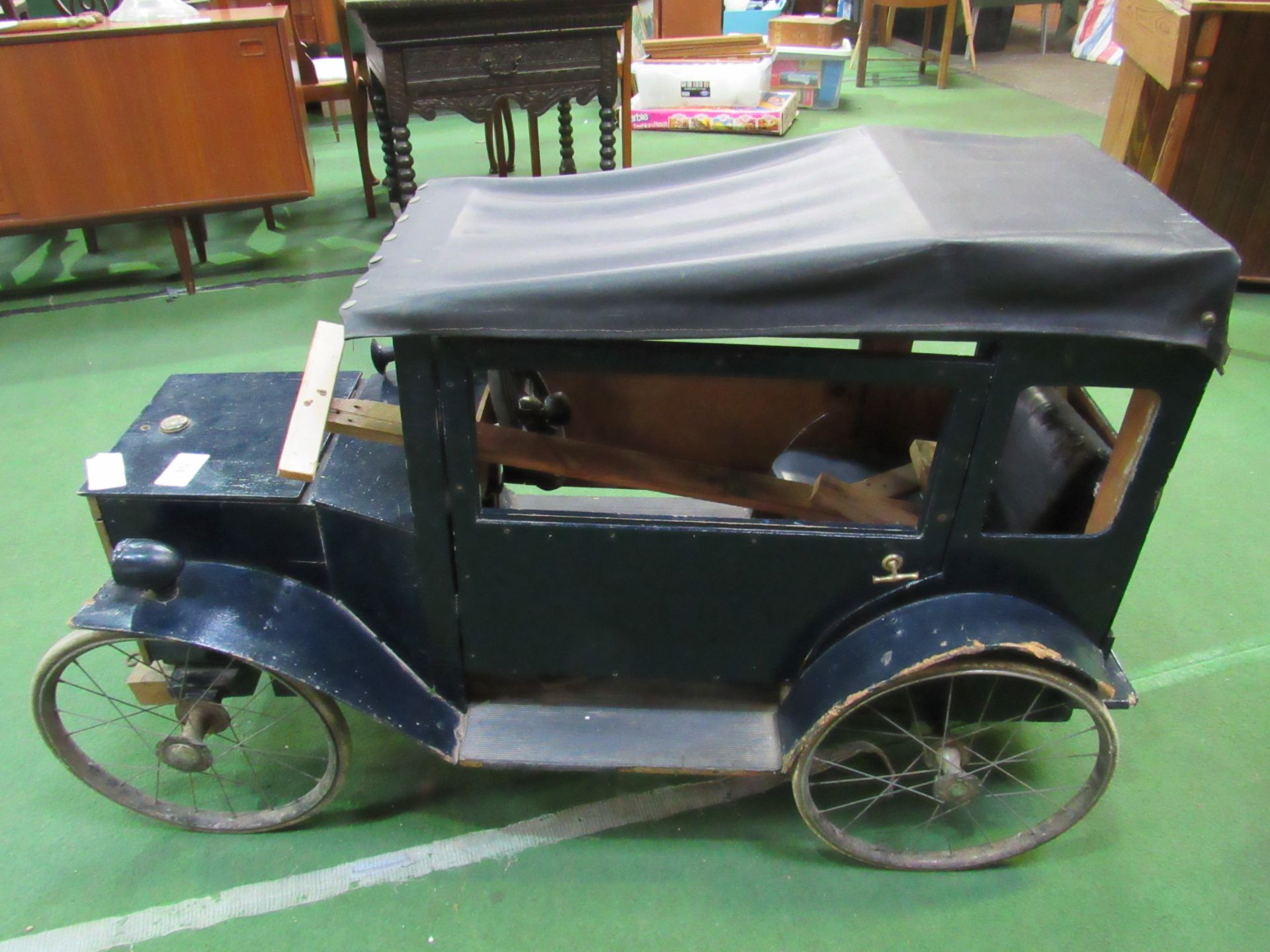 1950's scratch built Hillman classic pull-along/sit in toy wooden car. Estimate £80-100.