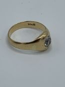 18ct gold and solitaire diamond ring. Size I, weight 3.4gms. Estimate £200-250.