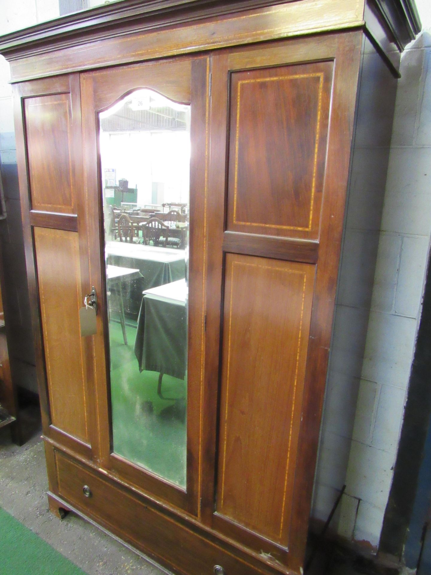 Edwardian mahogany wardrobe with mirror to door and drawer to base. 120 x 45 x 196cms. Estimate £ - Image 2 of 3