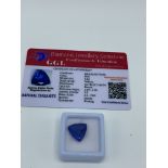 Trillion cut blue tanzanite, weight 9.45ct with certificate. Estimate £40-50.