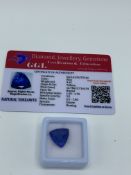 Trillion cut blue tanzanite, weight 9.45ct with certificate. Estimate £40-50.