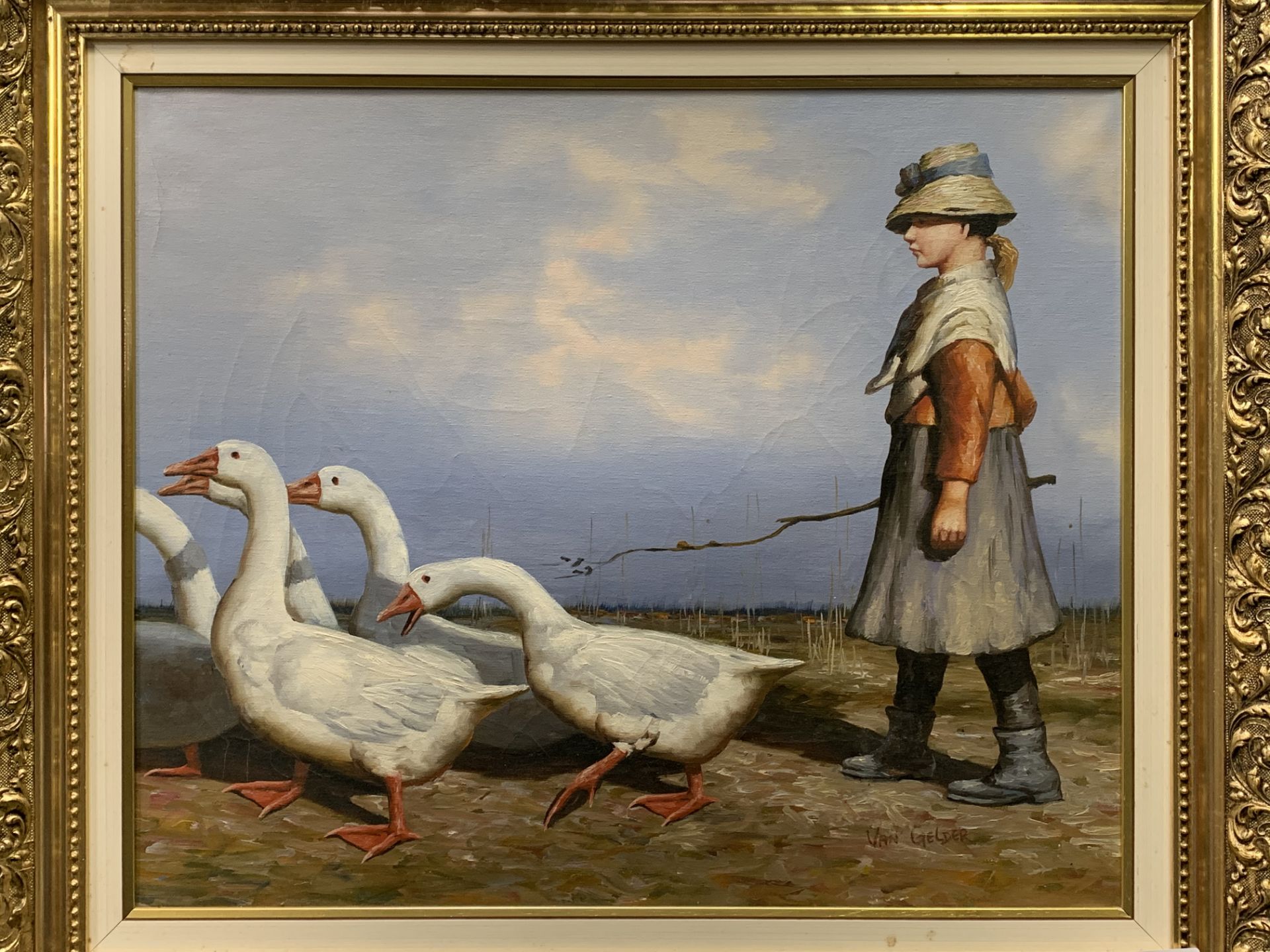 After J Guthrie. Framed oil on canvas of a girl herding geese, signed Van Gelder. 50 x 66cms.