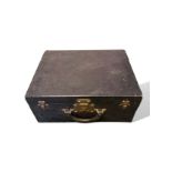 Louis Vuitton fitted dressing case, black textured leather exterior with brass lock and catches.