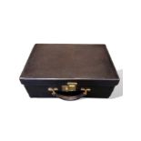 Goyard black textured leather fitted dressing case with 7 original silver topped jars and bottles,