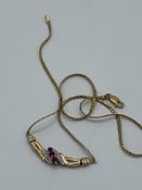 9ct gold ruby and diamond necklace, weight 6.6gms. Estimate £250-300.