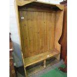 Pine settle converted to coat and boot storage, 129 x 31 x 186cms. Estimate £50-80.