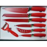 Waltmann 7 piece knife set in red. Estimate £15-20.