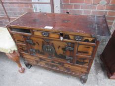 Upholstered stool; oriental style cabinet, as found, and shaped occasional table.