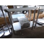 90cm new stainless table with shelf. Estimate £80-85.