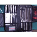 Samurai knife set in case. Estimate £50-55.